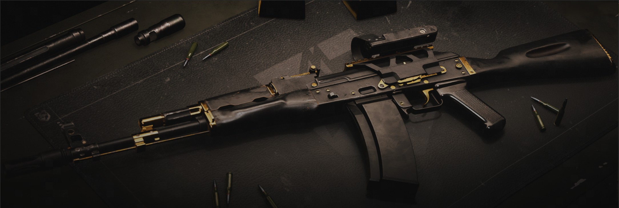 Black and Gold AK74 cosmetic on a workbench
